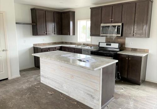 Kitchen with Large Island & Stainless Appliances