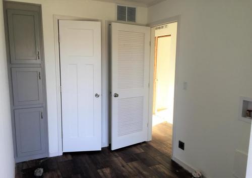 Utility Room with Hardwood Cabinet